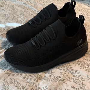 Women’s Black Sketcher Tennis Shoes